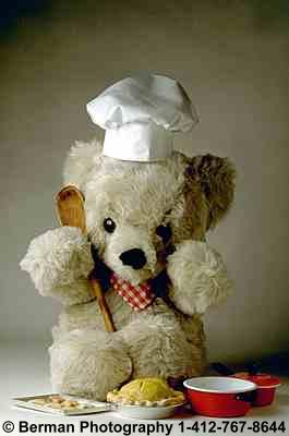 Chef Teddy Bear preparing dessert for all the other teddy bears