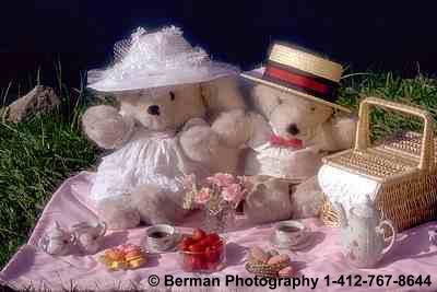 Victorian Teddy Bears enjoying an old fashion picnic.